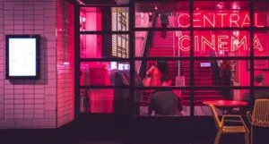 image of a cinema with pink lighting