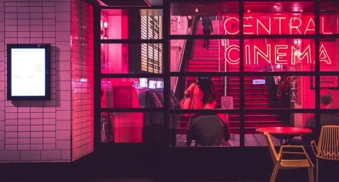 image of a cinema with pink lighting