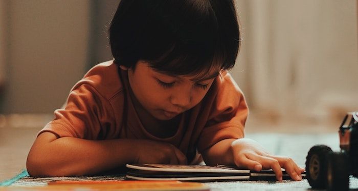 image of a child reading a book