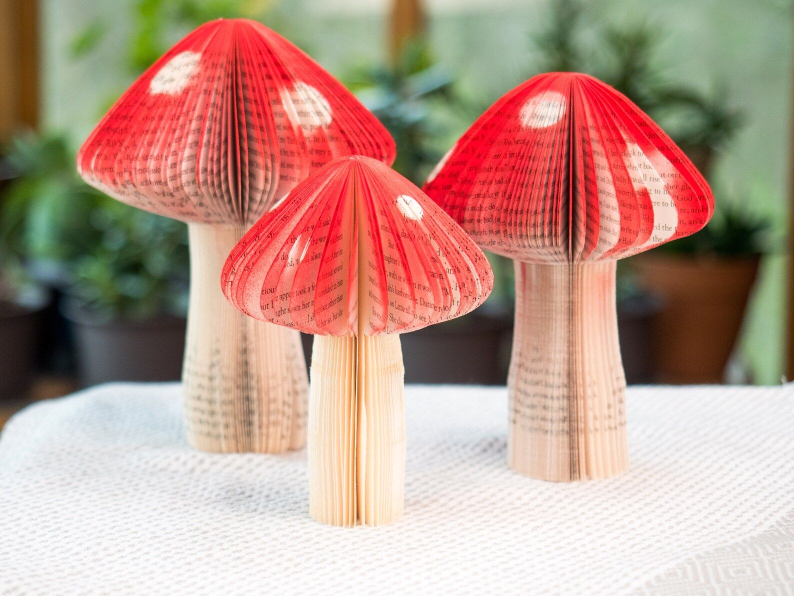 Red mushrooms made from book pages. 