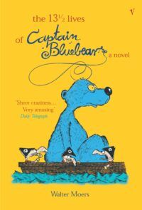 Book Cover for the 13 and a Half Lives of Captain Bluebear, showing a bright yellow background. In the foreground is an illustrated blue bear with yellow eyes, looking to the right of the book cover expectantly. He is in a boat on calm waters, with three bird like creatures in pirate hats.