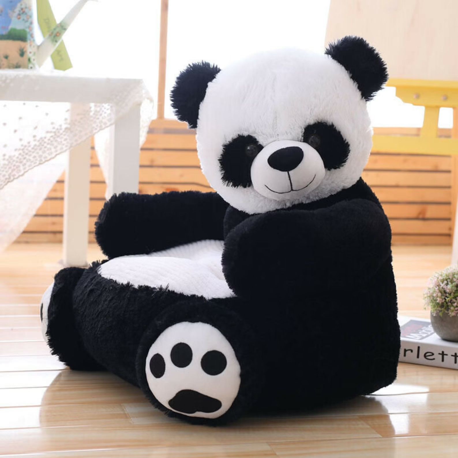 kids chair shaped like a stuffed panda