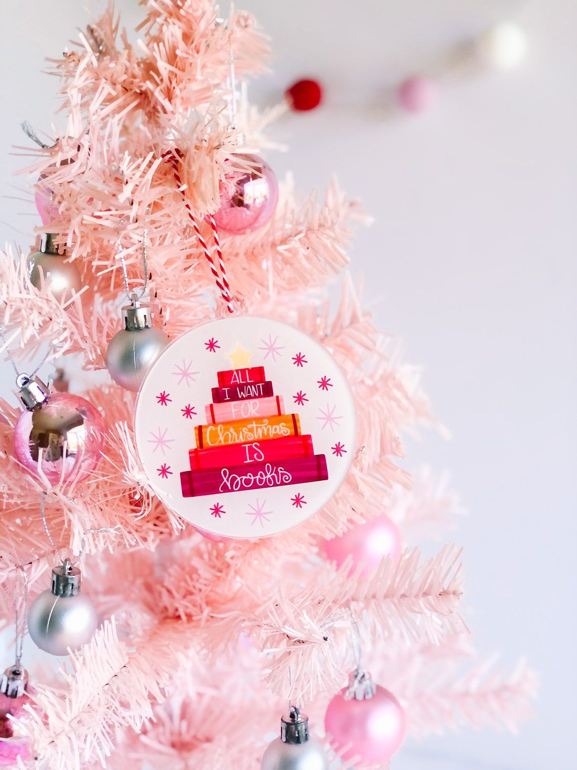 Bookish ornament with a colorful book stack