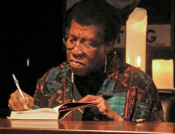 Octavia Butler signing a copy of Fledgling