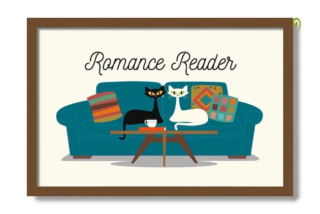 An art print of a teal couch with multi-colored cushions and two cats on it, one black, one white. On the coffee table is a book and a coffee cup. "Romance Reader" is written across the top of the print. 