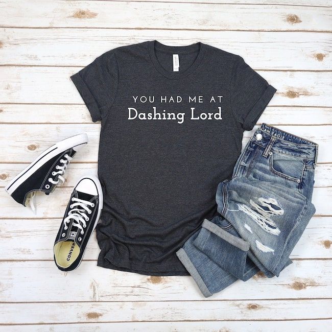 Tshirt with text "You had me at Dashing Lord" with sneakers and jeans