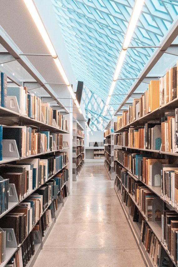 Bookshelves in a library in Seattle | Why Police Shouldn't Be in Libraries (And How You Can Help Change That) | BookRiot.com