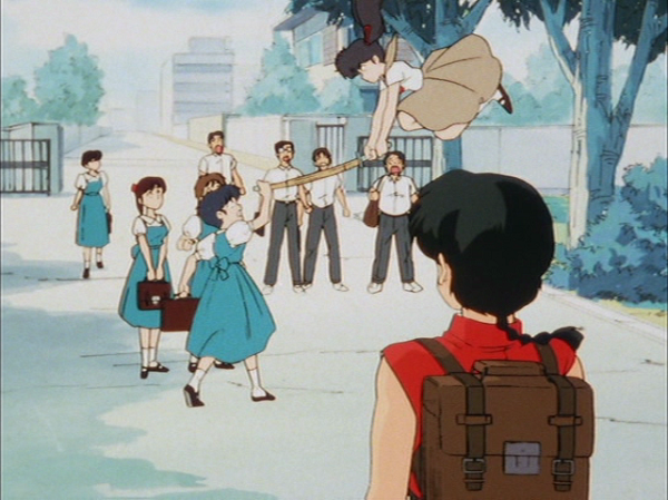 A screenshot from the Ranma 1/2 anime showing Akane defending herself from one of Kodachi's sneak attacks.