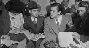 Orson Welles speaking to a group of reporters about The War of the Worlds radio broadcast