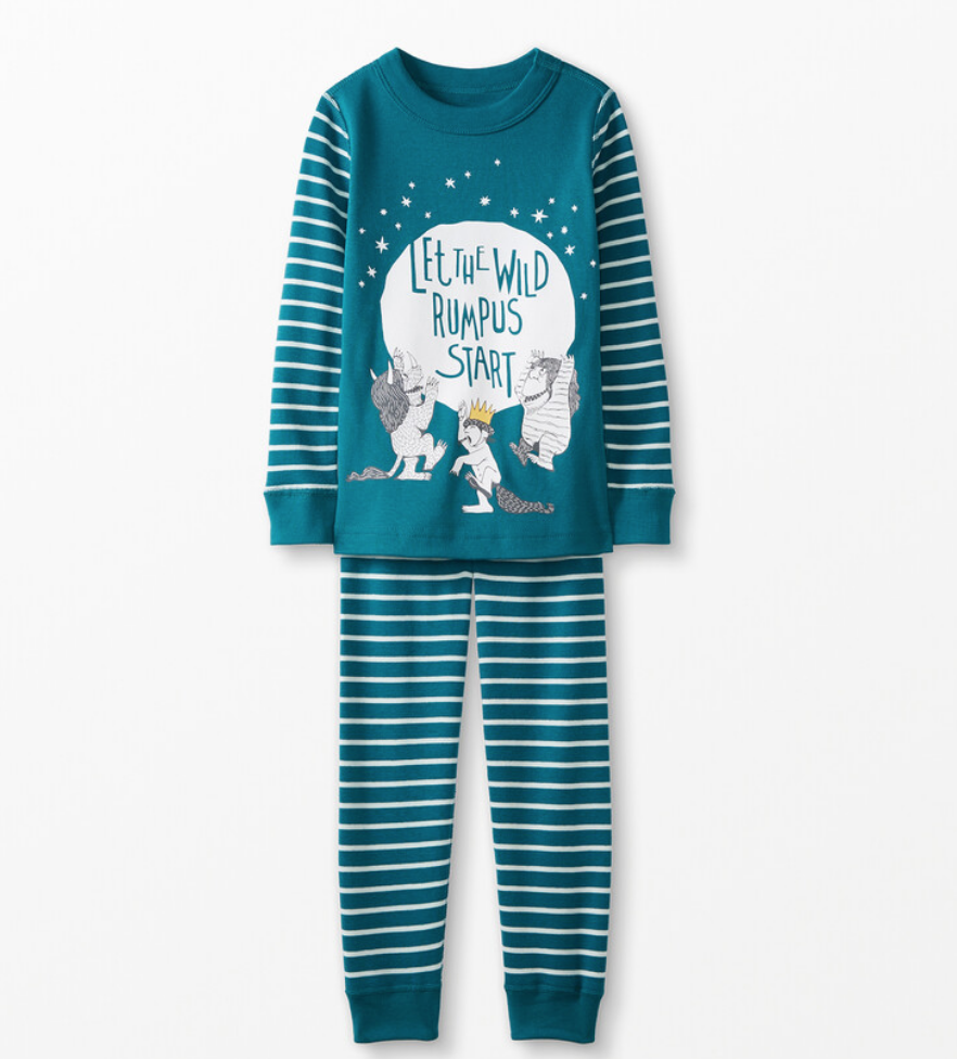 Blue long sleeved pj's with Wild Things from Maurice Sendak's Where the Wild Things Are, and the quote "Let the wild rumpus start"
