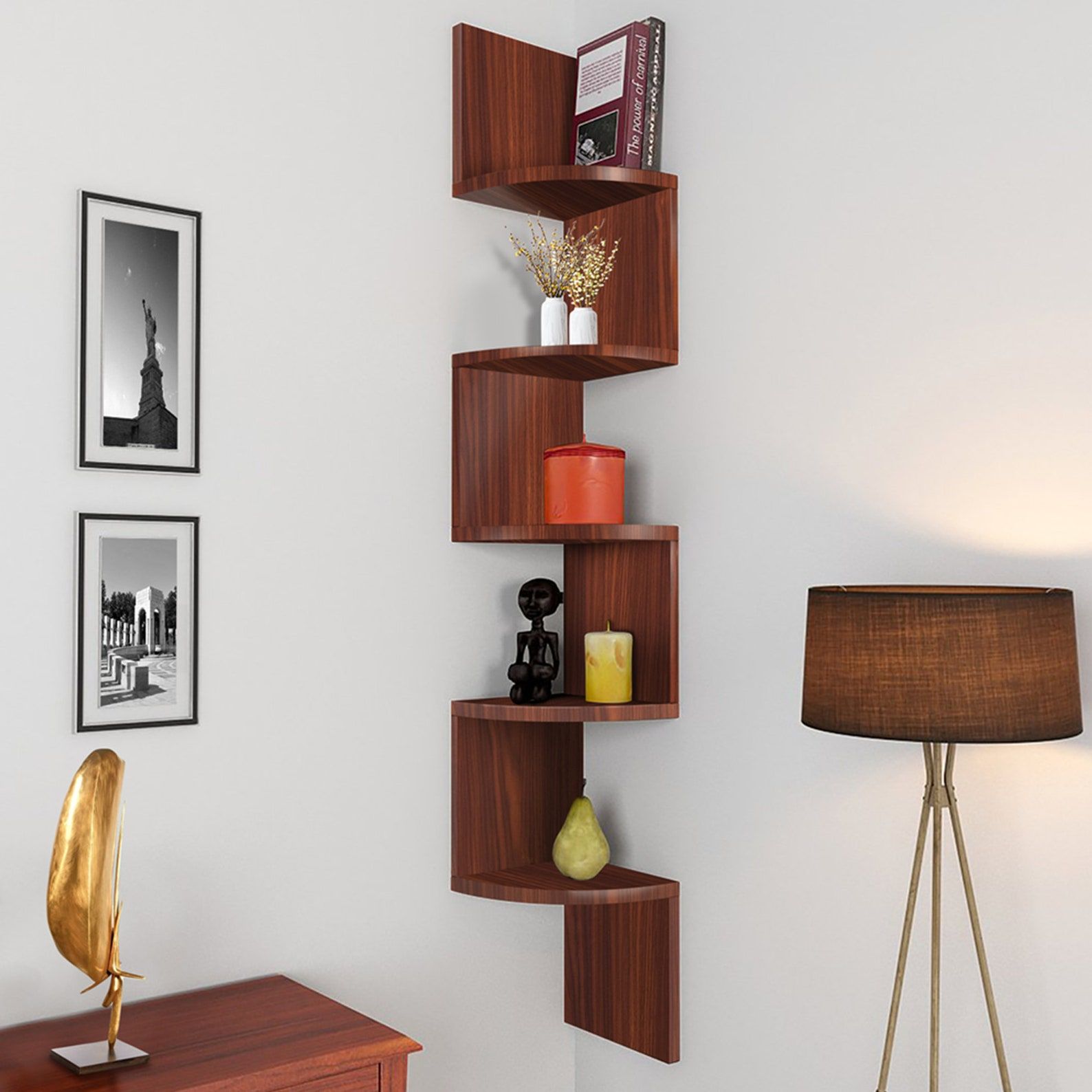 wooden corner wall shelf with books and candles on the shelves 