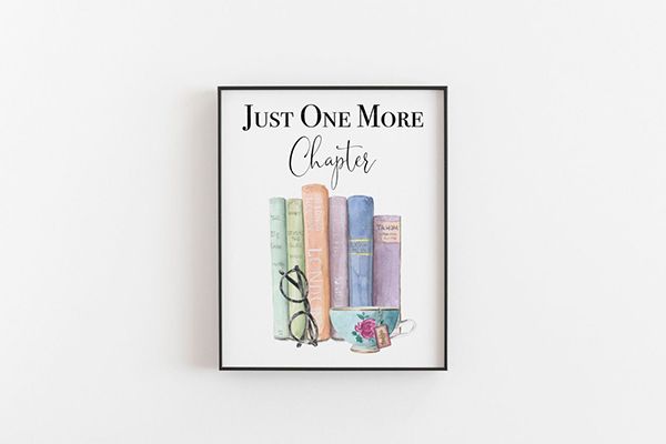 Frame of books on wall with text "Just One More Chapter"