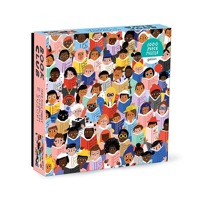Image of a puzzle featuring a wide range of faces in various skin tones each reading a book. Yes, there's a cat, too. 