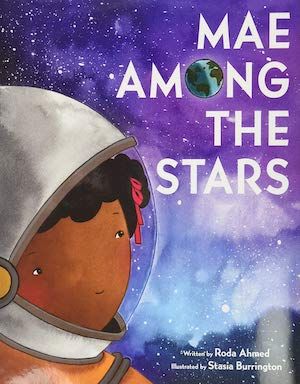 cover of Mae Among the Stars by Roda Ahmed, showing a brown-skinned girl in an astronaut helmet with a purple and blue sky in the background