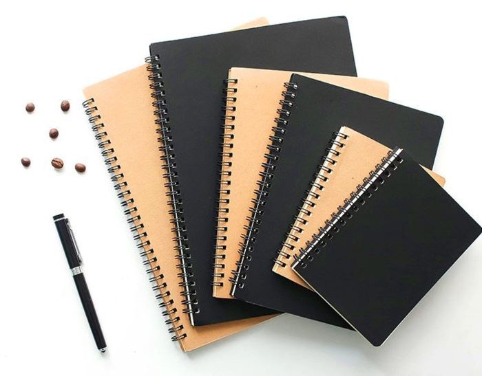 6 spiral bound brown and black notebooks