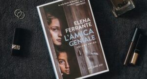 a photo of the Italian edition of My Brilliant Friend surrounded by makeup, perfume, and jewelry