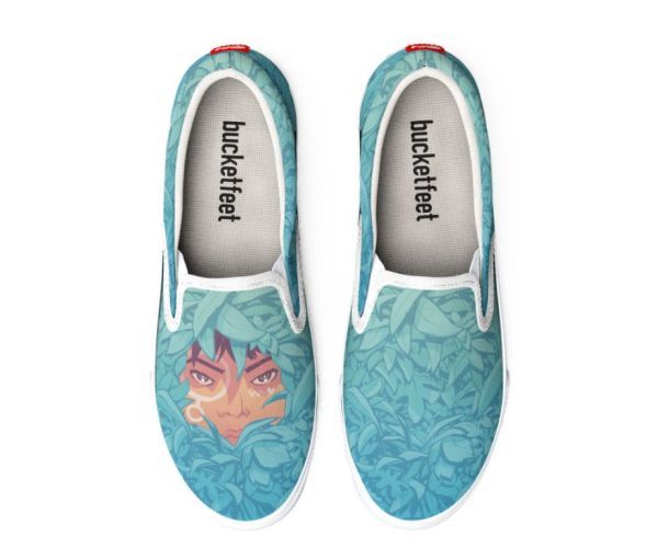 Wari face peering out through dense foliage illustrated by Cliff Chiang on a pair of slip-on shoes