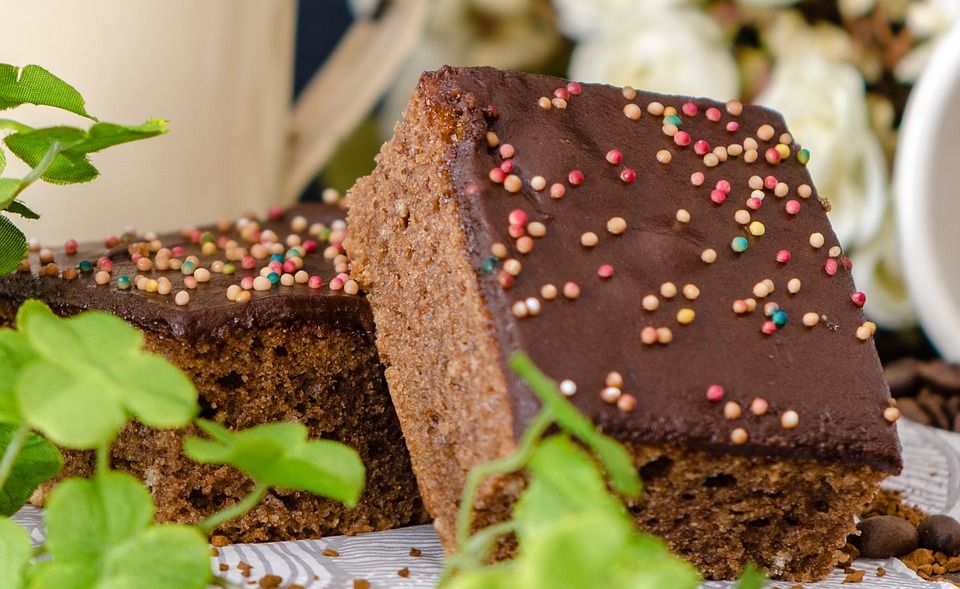 Brownies with chocolate frosting and sprinkles