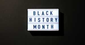 a photo of a Lightbox with text BLACK HISTORY MONTH on dark black background