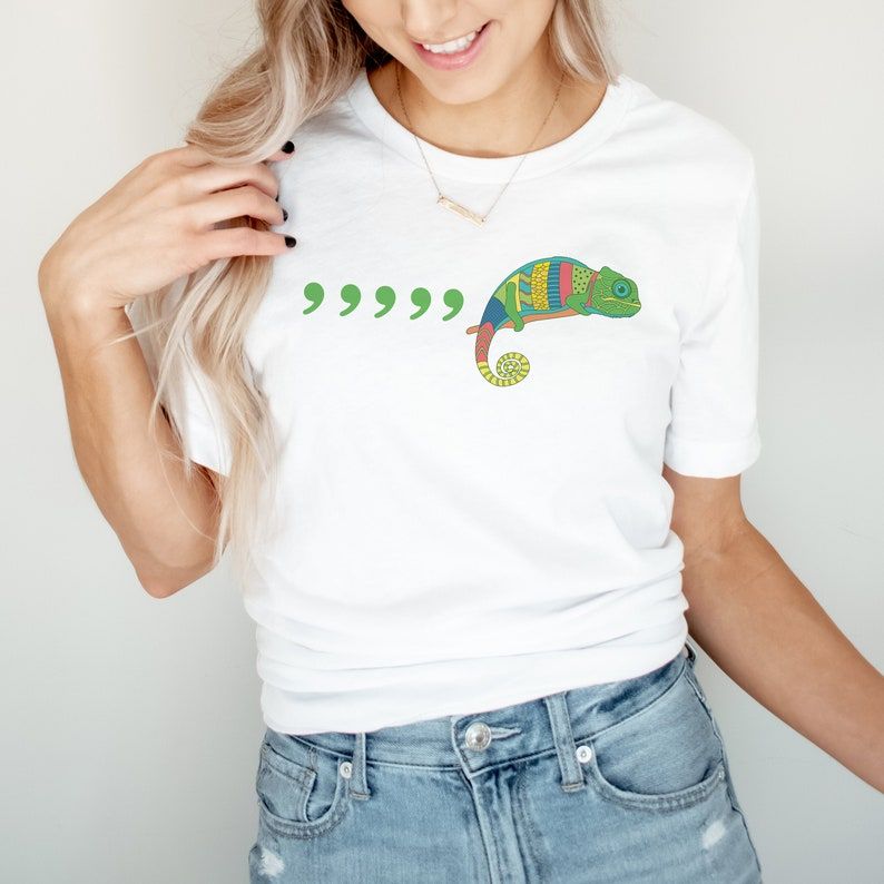 A white woman wearing a white shirt. It has 5 green commas, followed by a chameleon. 