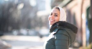 image of a woman in a hijab and winter coat