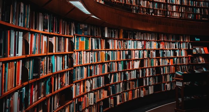 carrying books in library