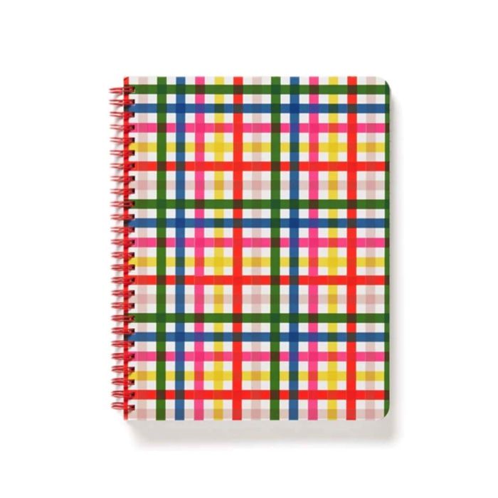 a mini notebook in a colorful rainbow plaid pattern