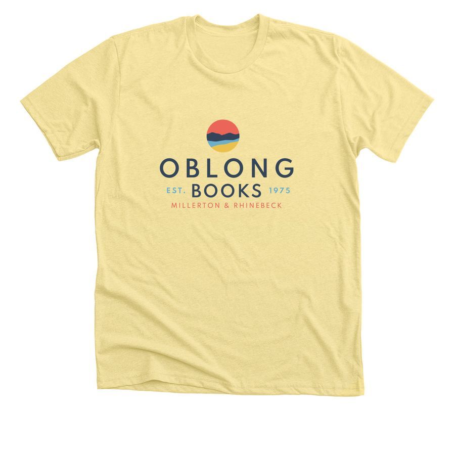 Yellow t-shirt with the words "Oblong Books" and their logo, a color block depiction of mountains, a river, and the sky