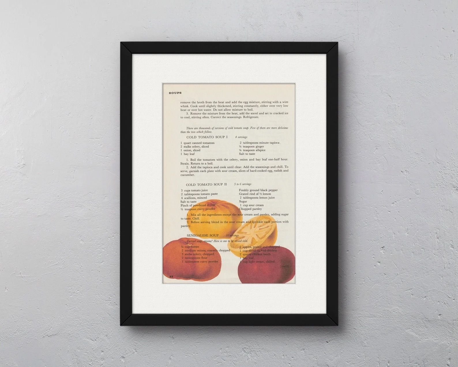 A print of a page from a vintage cookbook with an illustration of red and yellow tomatoes.