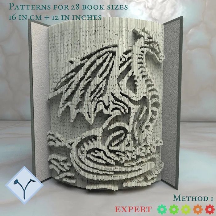 a book whose pages have been folded into the shape of a dragon