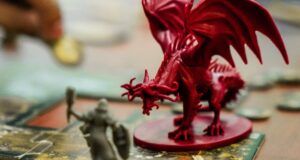 red dragon action figure on table