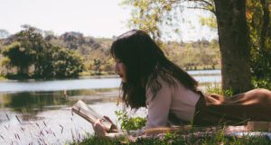 Girl reading (photo from Unsplash)