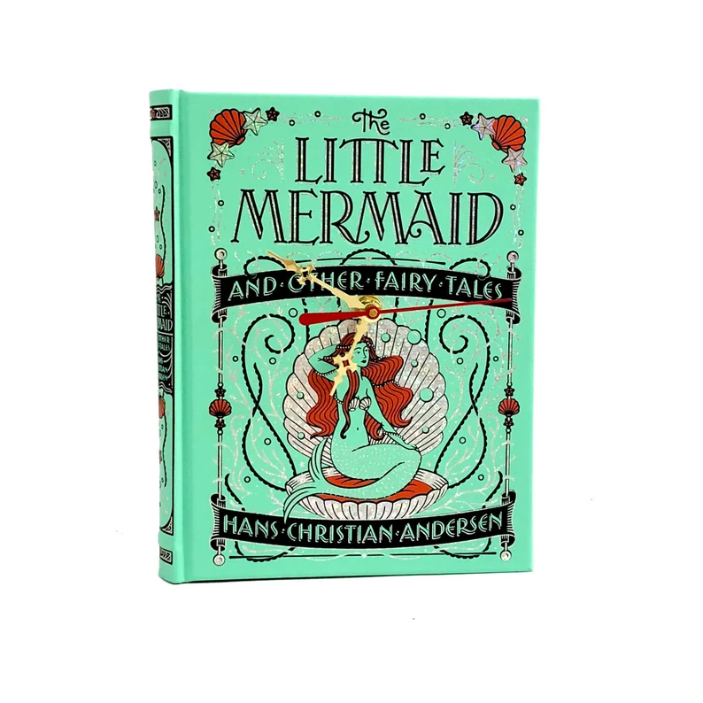 Image of a green edition of The Little Mermaid by Hans Christian Andersen. It's been turned into a clock. 
