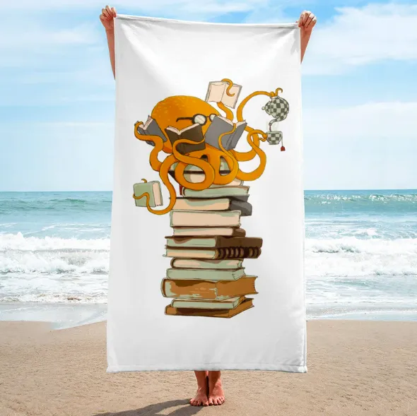 Person on beach holding up white beach towel with image of an octopus atop a stack of books, using tentacles to hold multiple books and kettle of tea being poured into teacup