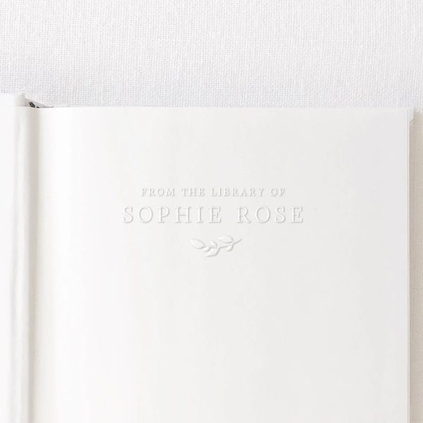 White page with the text "FROM THE LIBRARY OF SOPHIE ROSE" embossed