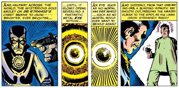 Four panels from Strange Tales #110.
Panel 1: Strange sits, face clenched in concentration, the gun aimed at his head in the foreground.
Narration Box: And, halfway across the world, the mysterious gold amulet on Dr. Strange's chest begins to glow - brighter, even brighter...
Panel 2: Close up on the glowing amulet.
Narration Box: ...until it slowly opens, revealing a fantastic metal eye within...
Panel 3: It glows brighter.
Narration Box: An eye such as no mortal has ever beheld...such as no mortal would ever want to behold again!
Panel 4: No Name is frozen in the beam of light coming from the amulet.
Narration Box: And suddenly, from that unblinking orb, a blinding hypnotic ray shoots out, freezing the amazed human to the spot, as his limbs grow strangely rigid!