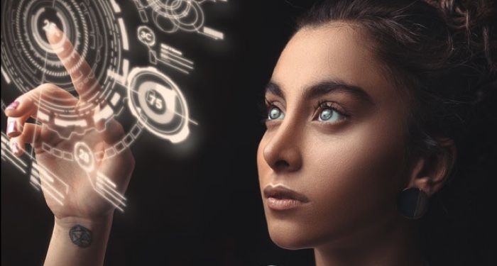 light-skinned woman looking with milky eyes at a futuristic display