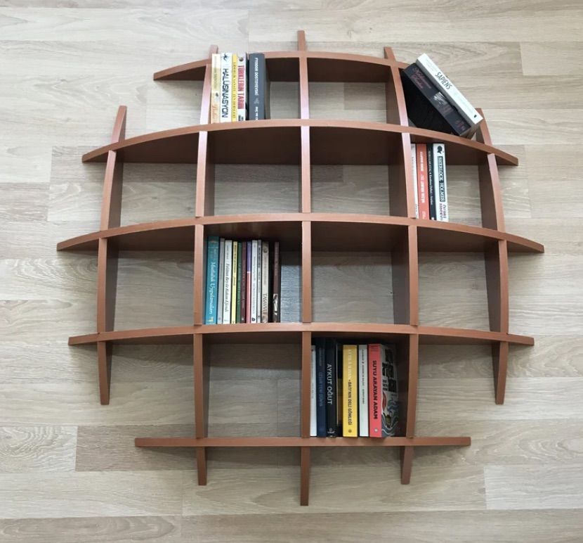 Image of a hemispheric bookshelf in dark brown. 