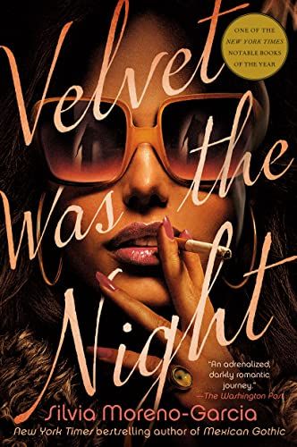 cover of Velvet Was the Night by Silvia Moreno-Garcia, showing the up-close face of a brown-skinned woman wearing large sunglasses and smoking a cigarette