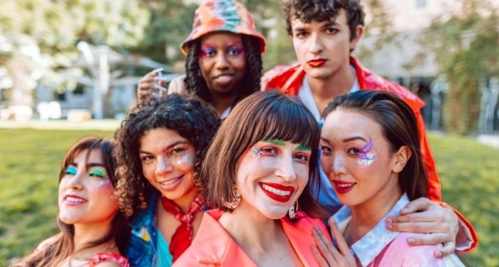 young people with a variety of skin tones colorfully adorned