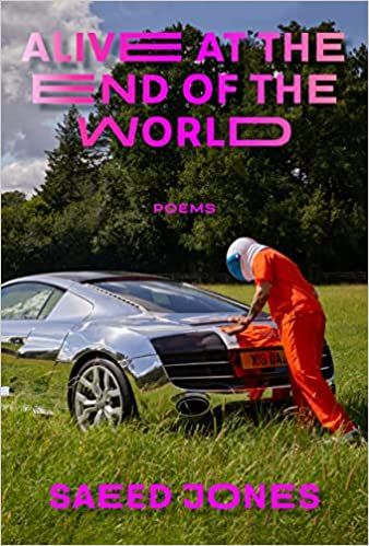 cover of Alive At The End of the World by Saeed Jones; photo of person in an orange jumpsuit and a space helmet pushing a silver car in the middle of a grassy field