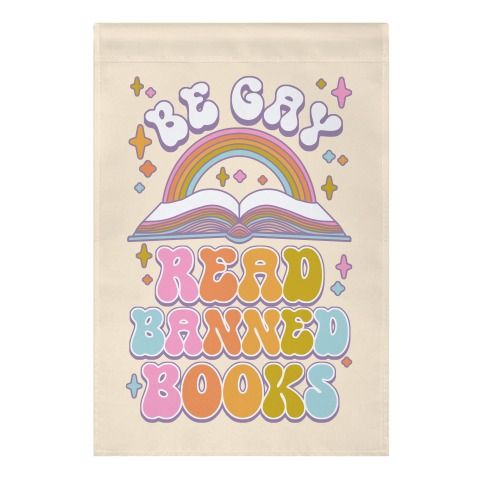 Beige garden flag with a pastel rainbow design and the phrase "Be gay, read banned books"
