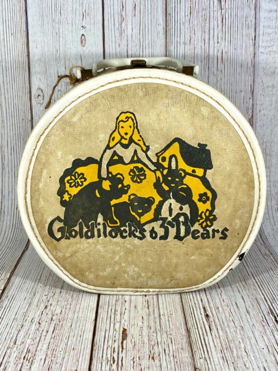 Antique Suitcase with Goldilocks on It