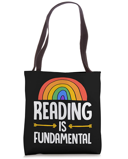 Black tote bag with a rainbow and the phrase "Reading is fundamental"