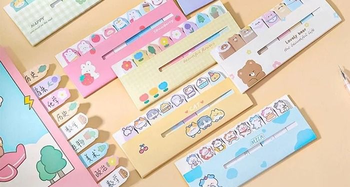 a photo of sticky tabs with adorable cartoon animals on them