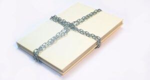 image of a book locked in chains