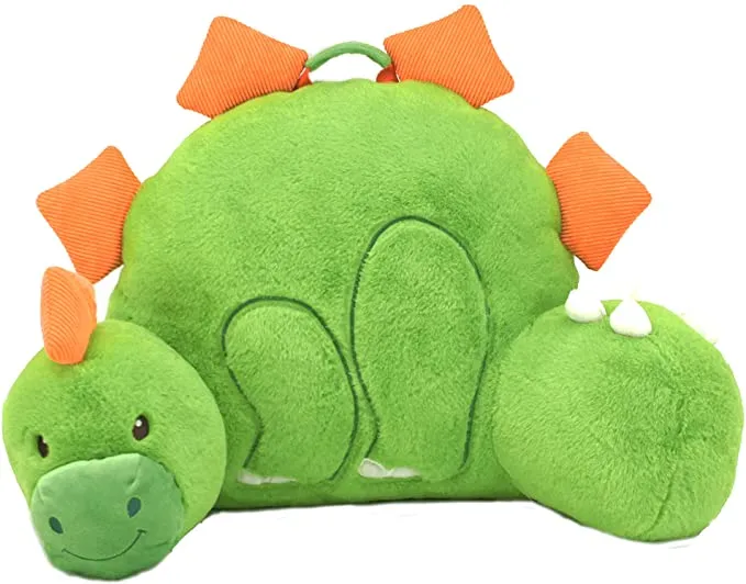 a photo of a dinosaur reading pillow