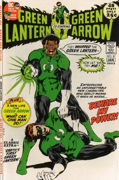 The cover for Green Lantern #87. Hal Jordan lies on the ground, while John Stewart stands over him in a Green Lantern uniform, holding him up by one arm, his ring glowing. He is saying 