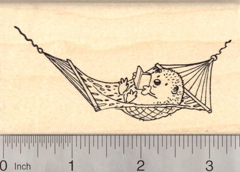 image of a stamp featuring a hedgehog reading a book in a hammock.