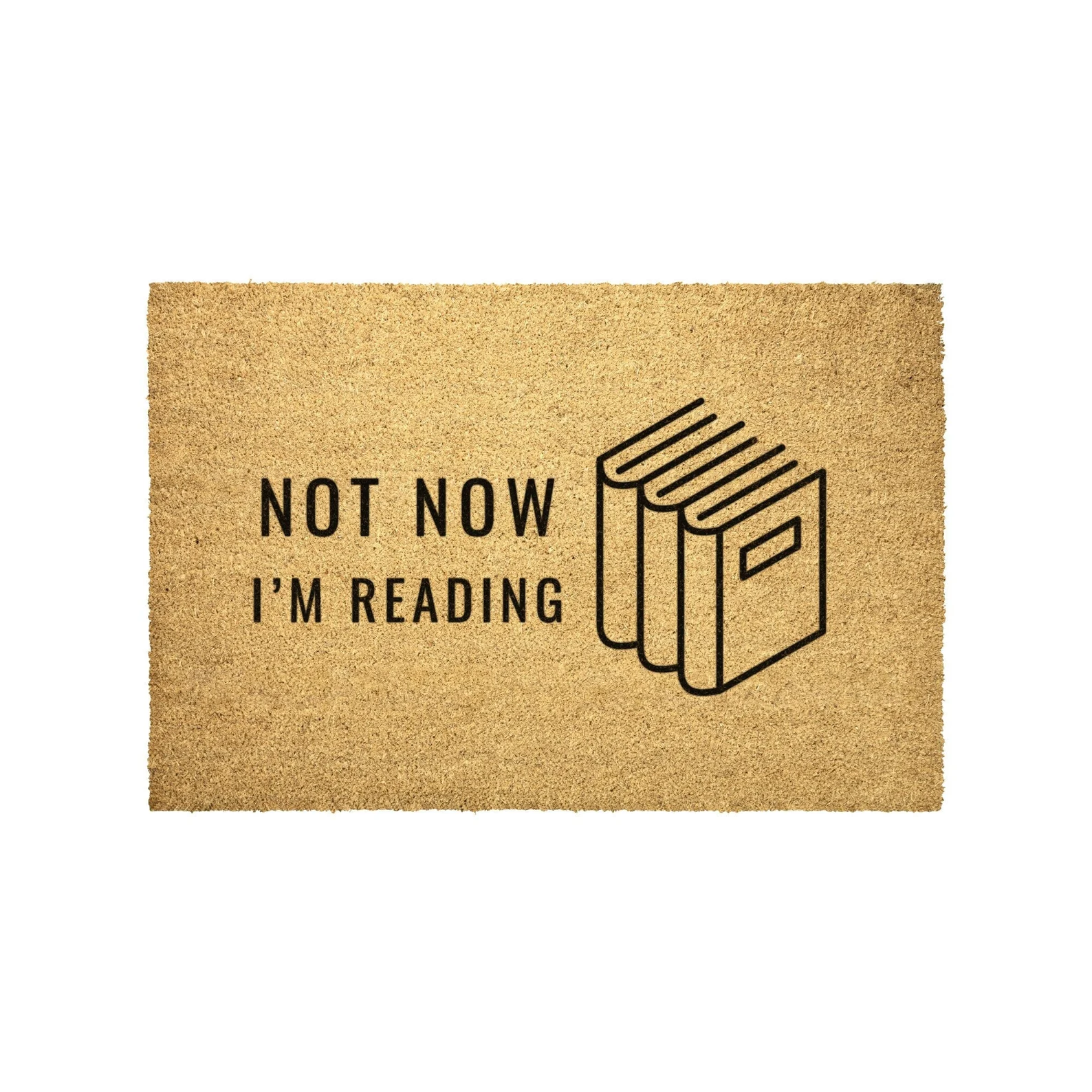 A tan doormat that says: Not Now I'm Reading, with an illustration of three books.